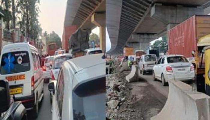 मलकापुरात कंटेनर खड्ड्यात अडकल्याने महामार्ग तीन तास ठप्प